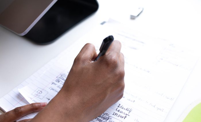 Girl writing on paper - 2560x1707